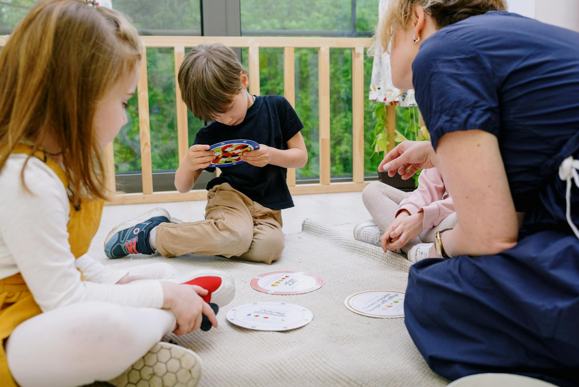 Kids participating in a fun and educational activity indoors, fostering learning and collaboration.
